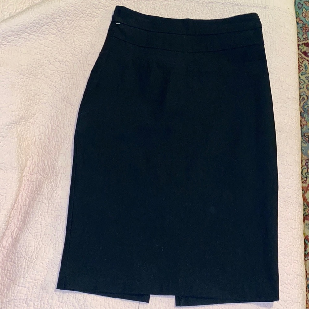 ABN sexy little black skirt. Rayon, nylon & spandex blend.  Size small in EUC.
